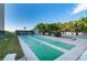 Community shuffleboard court surrounded by lush landscaping at 231 Hourglass Way # V5, Sarasota, FL 34242