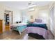 Bedroom featuring two beds, light colored floors and two windows at 2376 Novus St, Sarasota, FL 34237