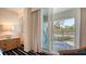This lovely balcony has seating and a view of the manicured lawn at 250 Sands Point Rd # 5101, Longboat Key, FL 34228
