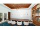 Elegant dining room featuring a large table, modern lighting, and stylish decor for memorable gatherings at 250 Sands Point Rd # 5101, Longboat Key, FL 34228