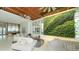 Beautiful lobby featuring stylish seating arrangements and a stunning vertical garden wall at 250 Sands Point Rd # 5101, Longboat Key, FL 34228