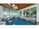 Relaxing lounge area with comfortable seating and scenic views of the ocean and pool at 250 Sands Point Rd # 5101, Longboat Key, FL 34228