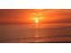 Beautiful orange sunset over the ocean at 250 Sands Point Rd # 5101, Longboat Key, FL 34228