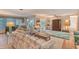 An expansive open living room with tile flooring, neutral walls, and plenty of space for entertaining at 2812 Casey Key Rd, Nokomis, FL 34275