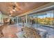 Open concept living area with views to the outside pool and patio at 2812 Casey Key Rd, Nokomis, FL 34275