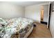 Bedroom featuring a bed with floral pattern, natural light and neutral walls at 3219 Aspen Ter, Sarasota, FL 34237