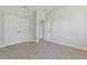 Empty bedroom featuring a large closet and bright lighting at 3294 Gowanda Ave, North Port, FL 34287