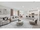 Bright living space showcasing an open floorplan, modern furnishings and decor, and a gorgeous kitchen at 3294 Gowanda Ave, North Port, FL 34287