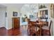Dining area with wood table and chairs, with easy access to the kitchen at 4563 Whirlaway Dr # C, Sarasota, FL 34233
