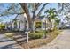 Charming home with lush landscaping, mature trees, and a welcoming screened-in porch at 4563 Whirlaway Dr # C, Sarasota, FL 34233