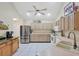 Spacious kitchen boasts ample cabinets, stainless steel refrigerator, and modern appliances at 4563 Whirlaway Dr # C, Sarasota, FL 34233