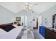 Serene bedroom features vaulted ceiling, neutral paint and easy access to ensuite at 4563 Whirlaway Dr # C, Sarasota, FL 34233