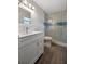 Modern bathroom featuring a glass-enclosed shower and vanity at 5115 Island Date Way, Sarasota, FL 34232