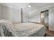 Cozy bedroom with a ceiling fan and lots of closet space, perfect for relaxation at 5115 Island Date Way, Sarasota, FL 34232