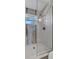 Bright bathroom features stylish shower with glass door and decorative tile surround at 5115 Island Date Way, Sarasota, FL 34232