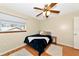 Cozy bedroom with hardwood floors and a soft rug underfoot at 6145 Bonaventure Ct, Sarasota, FL 34243