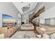Spacious open-concept living room with vaulted ceilings and an abundance of natural light at 6145 Bonaventure Ct, Sarasota, FL 34243