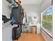 Walk-in closet with ample hanging space, vanity, makeup mirror and outside view at 6145 Bonaventure Ct, Sarasota, FL 34243