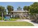 Nokomis Beach facility entrance with ramps, stairs, and a refreshments sign in a landscaped setting at 641 Verrocchio Dr, Nokomis, FL 34275