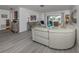 Spacious living area with modern furnishings and a view to the outside patio at 641 Verrocchio Dr, Nokomis, FL 34275