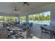 Community pool area boasts covered seating and plenty of lounge chairs for residents to relax and enjoy at 6634 Calypso Coral Ln, Sarasota, FL 34240