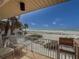 Relax on this cozy balcony with stunning ocean views and comfortable seating at 6701 Gulf Of Mexico Dr # 311, Longboat Key, FL 34228