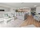 Open-concept living area with a blend of comfortable seating and stylish decor at 6701 Gulf Of Mexico Dr # 311, Longboat Key, FL 34228