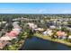 Community aerial view featuring homes with pools and waterfront views at 6922 Stanhope Pl, University Park, FL 34201