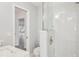 Clean bathroom with a glass-enclosed shower and modern fixtures at 730 Magellan Dr, Sarasota, FL 34243