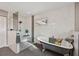 This bathroom has a standalone tub, tiled shower and modern finishes at 7415 36Th E Ave, Palmetto, FL 34221