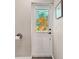 Bathroom door featuring a stained-glass window with underwater sea life at 7415 36Th E Ave, Palmetto, FL 34221