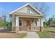 Charming home with a stone-accented facade and covered front porch entry at 7415 36Th E Ave, Palmetto, FL 34221