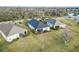 A tranquil neighborhood with beautiful single-Gathering homes, well-maintained lawns, and screened lanais at 11231 Woodlake Way, Parrish, FL 34219