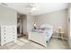 Comfortable bedroom includes a ceiling fan, carpeted floor, and neutral-tone walls at 11231 Woodlake Way, Parrish, FL 34219