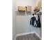 Empty closet features carpet and basic shelves and hanging racks at 11231 Woodlake Way, Parrish, FL 34219
