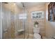 Beautiful bathroom with a tiled shower, glass door, and accent mosaic tile at 1521 67Th Street E Ct, Bradenton, FL 34208