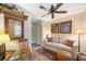 Cozy living room with wood-look mirror, sleeper sofa, and plush carpet at 1521 67Th Street E Ct, Bradenton, FL 34208