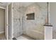 Luxurious bathroom showcasing a glass shower with marble tiles and modern fixtures at 198 Salem Nw Ave, Port Charlotte, FL 33952