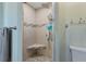 Updated bathroom with a tiled walk-in shower, shower seat, and modern fixtures at 198 Salem Nw Ave, Port Charlotte, FL 33952