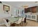 Elegant dining room featuring a modern glass table and access to other living spaces at 198 Salem Nw Ave, Port Charlotte, FL 33952
