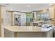 Modern kitchen featuring white cabinetry, stainless steel appliances, and a spacious countertop at 198 Salem Nw Ave, Port Charlotte, FL 33952