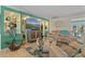 Comfortable living room with stylish decor, large windows, and a relaxing atmosphere at 198 Salem Nw Ave, Port Charlotte, FL 33952
