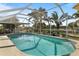 Refreshing screened-in pool with beautiful views of the surrounding landscape at 198 Salem Nw Ave, Port Charlotte, FL 33952