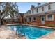 Beautiful pool with access to the home, surrounded by a brick patio at 2630 Moss Oak Dr # 50, Sarasota, FL 34231