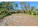 Expansive backyard with ample space for outdoor activities and gardening opportunities at 321 40Th Street Nw Ct, Bradenton, FL 34209