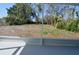 Spacious screened-in porch with an open view of the lush green backyard at 321 40Th Street Nw Ct, Bradenton, FL 34209