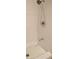 Tiled shower with rainfall shower head and bench at 321 40Th Street Nw Ct, Bradenton, FL 34209