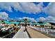 Picturesque waterfront view with boats, clear blue skies, and inviting waterside dining at 321 40Th Street Nw Ct, Bradenton, FL 34209