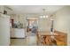 Charming kitchen with a dining area and a view through the home's living spaces at 3365 7Th St, Sarasota, FL 34237