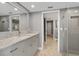 Modern bathroom with granite countertops, sleek cabinetry, and a glass-enclosed shower for a spa-like experience at 3783 Beneva Oaks Blvd, Sarasota, FL 34238